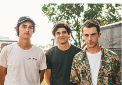 Minnette, the singer and rhythm guitarist of the band Wallows, with his band members Braeden and Cole