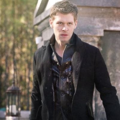 Joseph Morgan as Klaus Mikaelson; he reprised the role in The Vampire Diaries and its spin-off The Originals